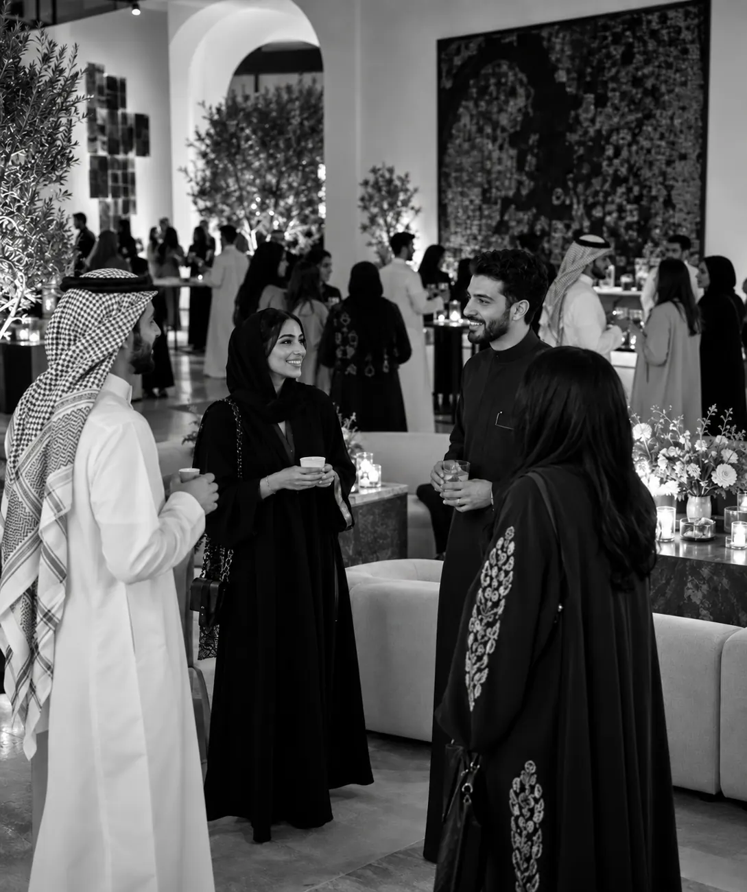 Guests in conversation at a Maktoub gathering