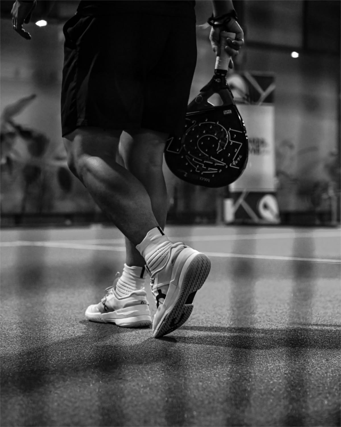 Padel player on court